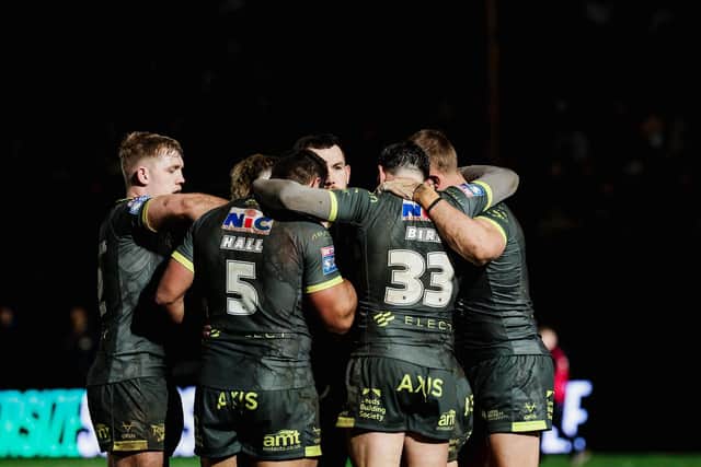 Leeds Rhinos players celebrate during their Good Friday win at Bradford Bulls. Coach Brad Arthur has put a big emphasis on 'team identity'. Picture by Alex Whitehead/SWpix.com.