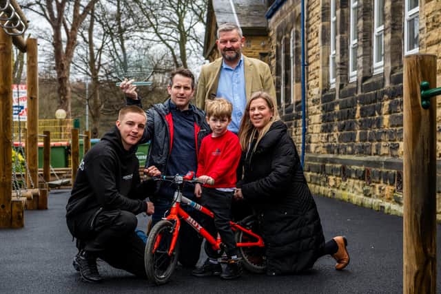 The Gary Day Foundation awarded Huey Martin, aged five a pupil at Moortown Primary School, Leeds, for taking part in a sponsored bike ride. Pictured is Jack Bateson, a professional boxer from Leeds and an ambassador for the Gary Day Foundation, with Huey Martin, his parents Phil and Laura Martin and Gary Day, founder of the Gary Day Foundation. Photo: James Hardisty