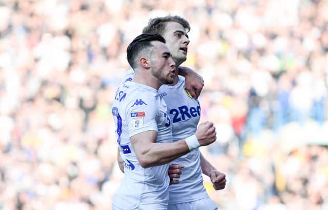 LEEDS, ENGLAND - FEBRUARY 23: Patrick Bamford of Leeds United celebrates with Jack Harrison after scoring the opening goal from a penalty during the Sky Bet Championship match between Leeds United and Bolton Wanderers at Elland Road on February 23, 2019 in Leeds, England. (Photo by George Wood/Getty Images)