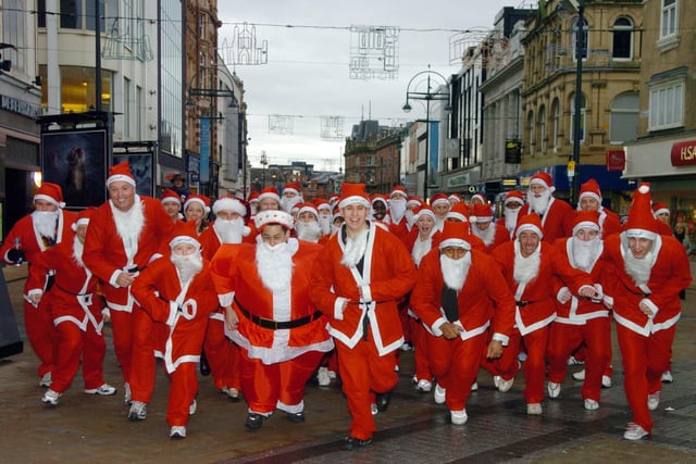 Santa Dash on Briggate in Leeds city centre, in aid of St Gemma'a Hospice, in December, 2006.