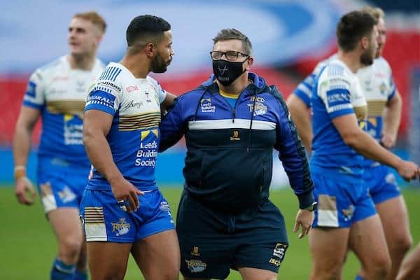 Team manager Jason Davidson celebrates wioth Kruise Leeming after Rhinos' Challenge Cup win at Wembley in 2020. Picture by Ed Sykes/SWpix.com.
