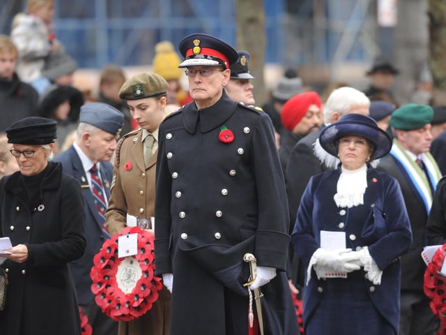At 11am there was a two-minute silence which was preceded by a bugler who sounded the Last Post. Pictured: Lord Lieutenant of West Yorkshire Ed Anderson.