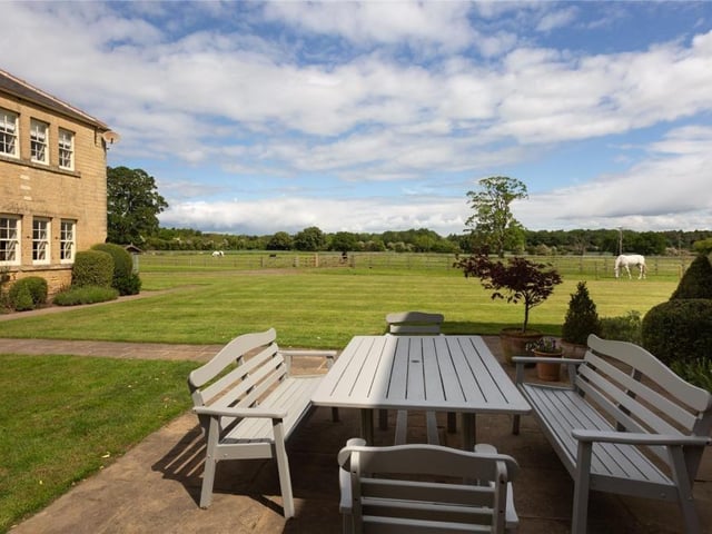 There are numerous garden areas around the house and cottages, many with flagged seating areas bordered by colourful plants and shrubs. These give way to open lawns which envelop the whole estate, bordered by paddocks to the north and mature woodland to the south and open farmland to the east and west.
