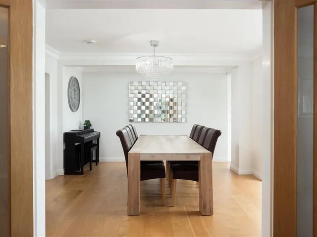 The open plan kitchen/living/diner is the show-stopper of the home and benefits from underfloor heating beneath the tiled floor in the kitchen