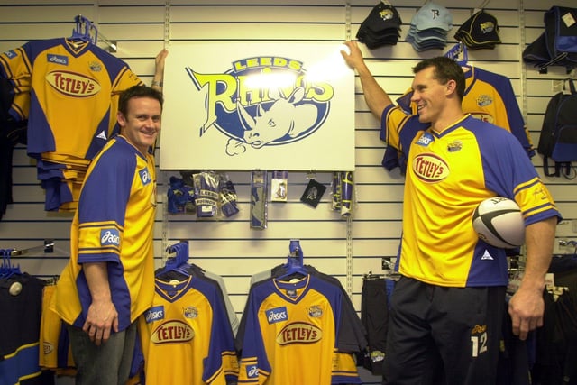 Rhinos stars Francis Cummins, left, and Matt Adamson help out at the new club shop.