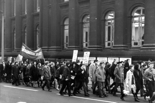 February 1967 and a student parade makes its way along Calverley Street, past Leeds Town Hall in a protest at the increase of overseas student fees by the government. More than 3,000 students made this the biggest demonstration ever seen in the city.