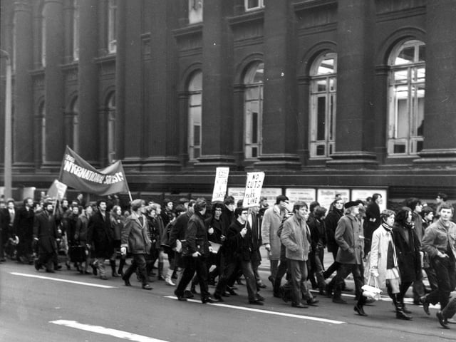 February 1967 and a student parade makes its way along Calverley Street, past Leeds Town Hall in a protest at the increase of overseas student fees by the government. More than 3,000 students made this the biggest demonstration ever seen in the city.