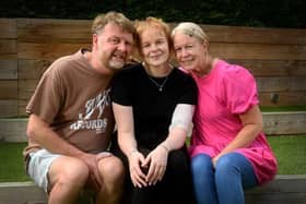 Emily Land with mum Kirstie Plenderleith and stepdad Andrew Plenderleith. Picture: Simon Hulme
