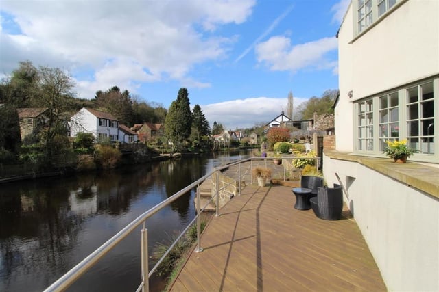 Stunning views of the River Nidd from the decked and paved areas outside the property.