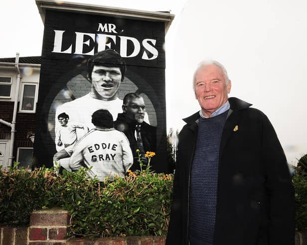 The mural also carries the famous quote from Don Revie which reads, 'when Eddie Gray plays on snow he doesn’t leave any footprints'. Pictured is Eddie Gray by his mural.