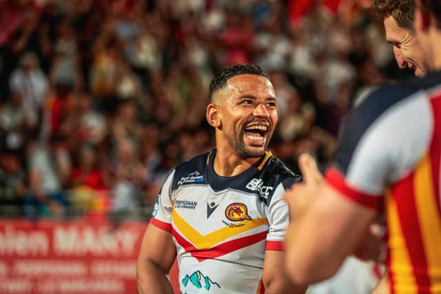 Former Leeds Rhinos hooker Kruise Leeming celebrates Catalans Dragons' win against Warrington Wolves. Picture by Rémi Vignaud/Catalans Dragons/SWpix.com.