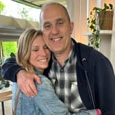 Natasha Loveridge, left, with her husband moments after finding out her tumours have reduced in considerable size.