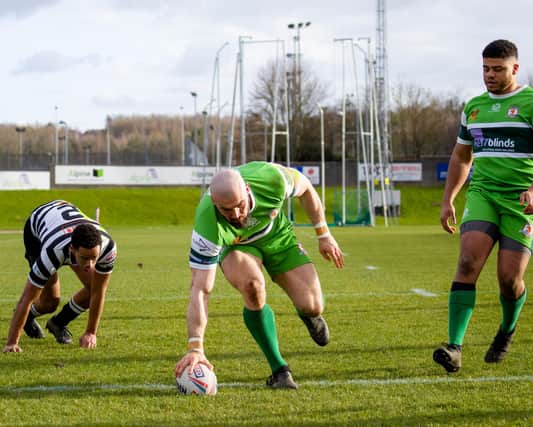 Adam Ryder scores for Hunslet in their Challenge Cup second round win over Heworth. Picture by Paul Whitehurst.