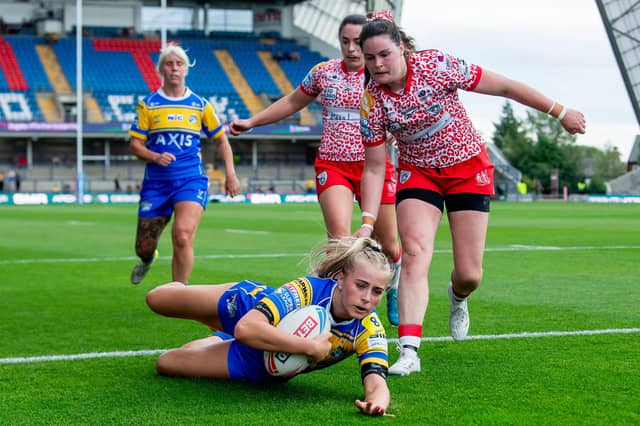 Ruby Walker scores for Leeds Rhinos in last week's Women's Super League win against Leigh Leopards at AMT Headingley. Picture by Allan McKenzie/SWpix.com.