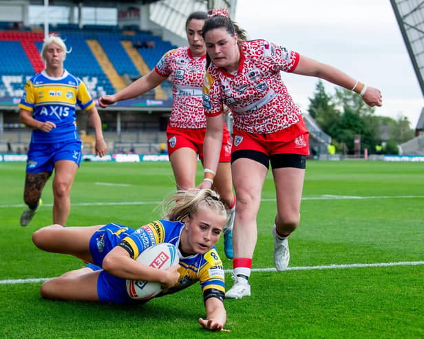 Ruby Walker scores for Leeds Rhinos in last week's Women's Super League win against Leigh Leopards at AMT Headingley. Picture by Allan McKenzie/SWpix.com.
