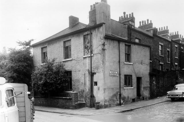 This section of Little Woodhouse Street has Back Springfield Place leading off on the right. Access to Caledonian Street was down Springfield Place. Pictured in July 1960.