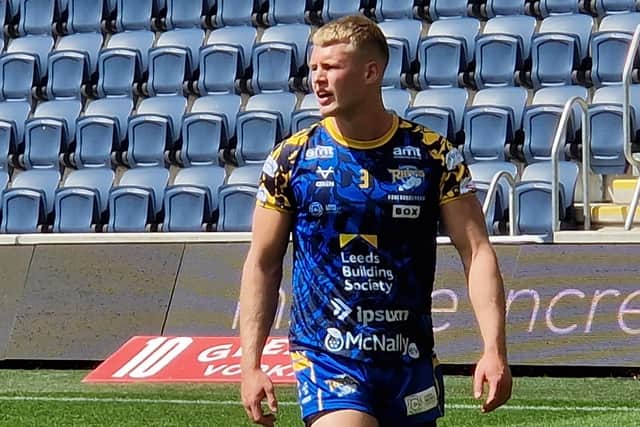 Leeds Rhinos' Max Simpson warms up before his first game since January, 2023. Picture by Peter Smith.