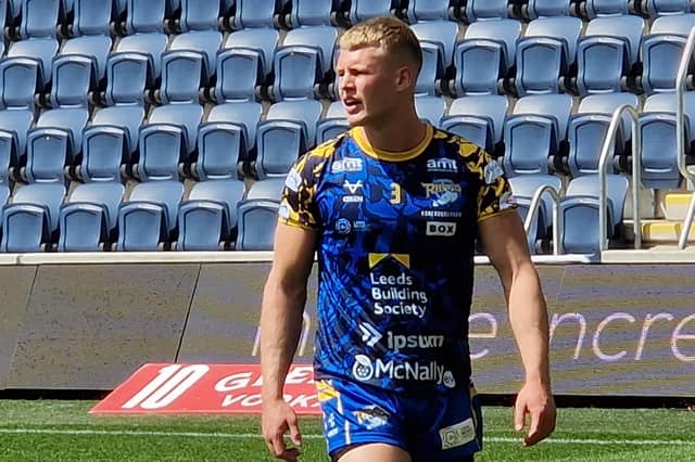 Leeds Rhinos' Max Simpson warms up before his first game since January, 2023. Picture by Peter Smith.