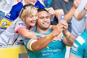 Sam Lisone takes a selfie with a fans after Rhinos' victory at Hull FC. Picture by Allan McKenzie/SWpix.com.