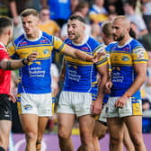 Leeds Rhinos' Ash Handley, Jake Connor and Jarrod O’Connor make a point to referee Jack Smith during the 6-0 loss to St Helens. Picture by Alex Whitehead/SWpix.com.