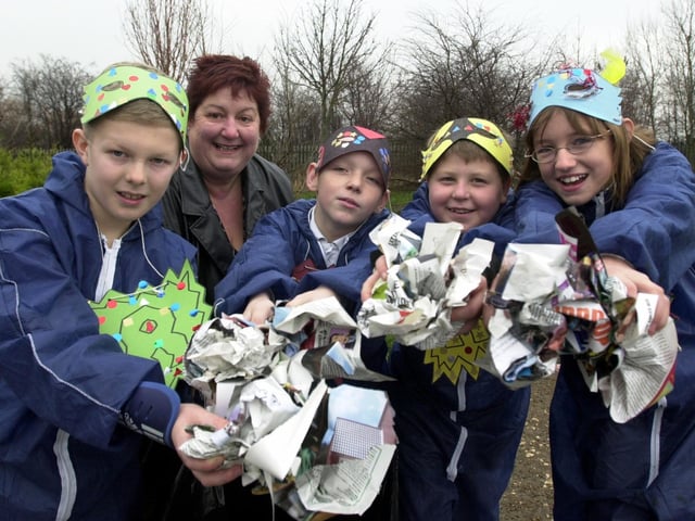 December 2003 and Hugh Gaitskell Primary School pupils were dressed as recycling warriors at the launch of Community Pride, an initiative which aimed to actively involve local people in tackling litter. Pictured, from left are James Mann, Joe Kelly, Tom Leak and Emily Jackson with Coun Angela Gabriel, chair of the community involvement team.