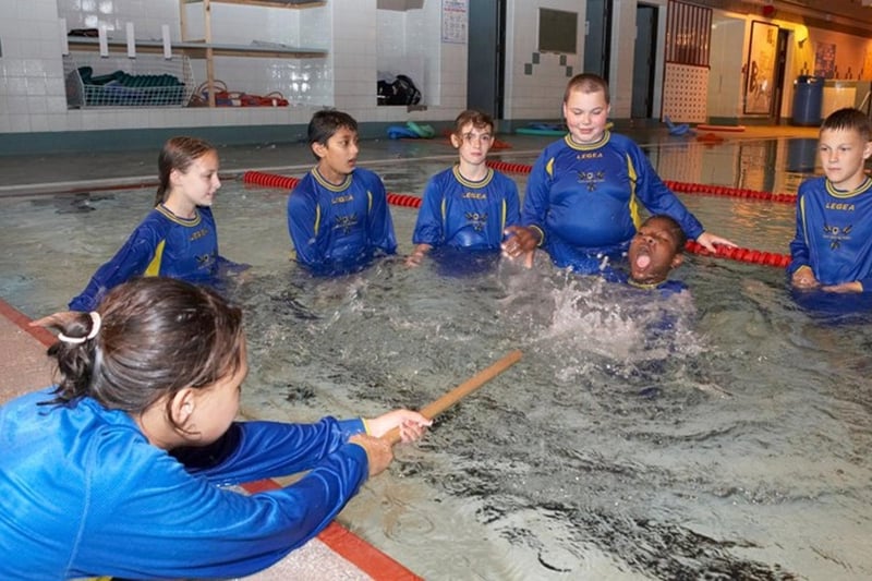 Year 8 children from South Leeds High School demonstrate lifesaving techniques they learned as part of lessons via Leeds City Council's Wise Up to Water campaign in July 2007.