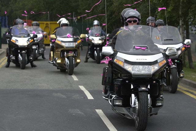 Members of the Gold Wing Owners Club (Yorkshire region) leaving ASDA at Glasshoughton, Castleford, on their fundraising ride in aid of the Tickle Pink breast cancer charity, pictured on September 14, 2002.