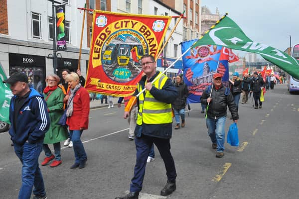 Marchers held colourful banners as they proceeded through Leeds city centre for the May Day March.
