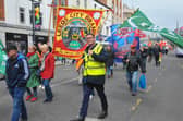 Marchers held colourful banners as they proceeded through Leeds city centre for the May Day March.