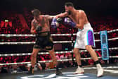 Slim Albaher (right) in action against Tom Zanetti in the light-heavyweight bout at the OVO Arena Wembley. Picture: PA Wire