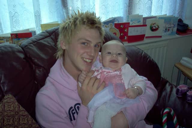 Adam Chadwick with his baby daughter Ruby. Picture: Martin Chadwick/SWNS