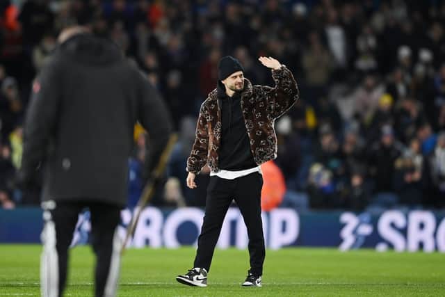 LEEDS, ENGLAND - JANUARY 18: Mateusz Klich of Leeds United, who is leaving Leeds United to join D. C. United, acknowledges the fans prior to the Emirates FA Cup Third Round Replay match between Leeds United and Cardiff City at Elland Road on January 18, 2023 in Leeds, England. (Photo by Michael Regan/Getty Images)