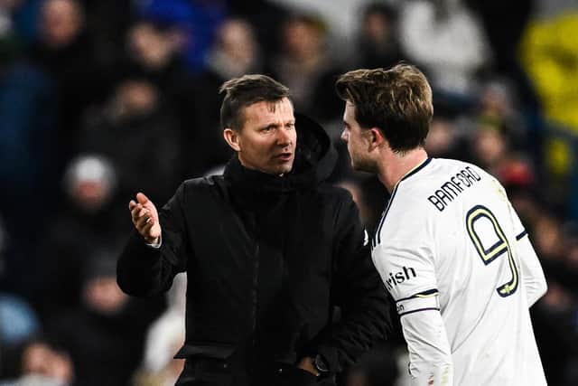 POSITIVE UPDATE: On Leeds United striker Patrick Bamford, right, from Whites head coach Jesse Marsch, left. Photo by PAUL ELLIS/AFP via Getty Images.
