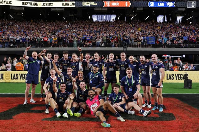 Leeds Rhinos pose for a team picture with their fans as they celebrate Saturday's stunning 58-6 victory over Hull KR at Allegiant Stadium in Las Vegas. Here's how the Leeds players rated.