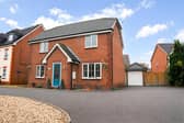 The property, on Royal Birkdale Way, benefits from a generous frontage, with a double driveway to the side alongside an additional gravelled parking area.