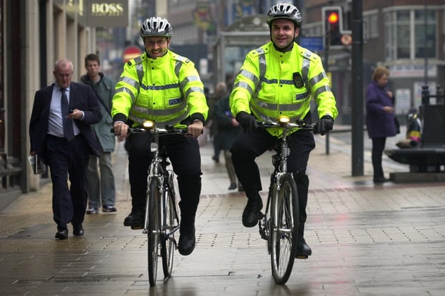 PC David Robinson and Insp Phil Wright patrol Vicar Lane on bikes in November 2002 enabling them to access incidents more quickly.