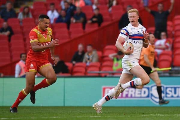 Lachlan Walmsley breaks free to score Wakefield Trinity's first try in their 1895 Cup final win against Sheffield Eagles at Wembley. Picture by Richard Blaxall/SWpix.com.