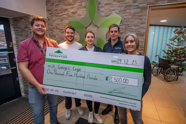 B&DWYW - 2 - The Technical team handing the cheque to Richard at St George's Crypt