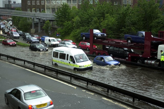 Torrential rain brought commuter chaos to the city centre in July 2002.