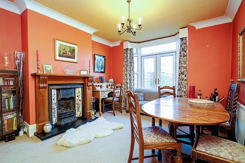 The front room provides lounge space with fireplace and bay window, whilst the rear is utilised as a dining room with access to the rear garden.