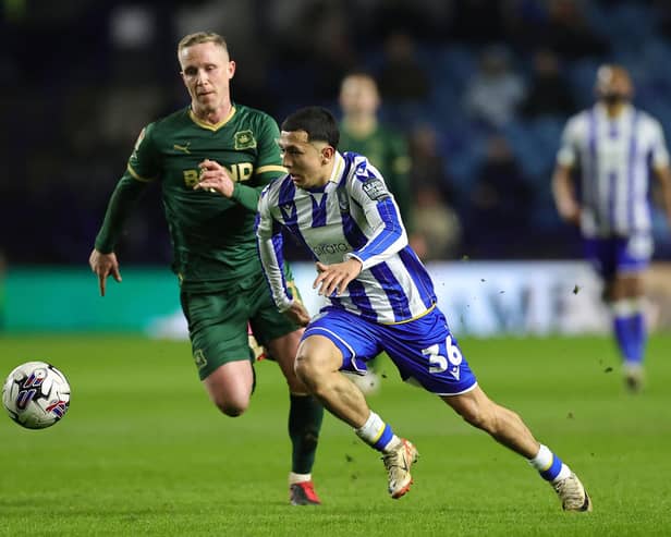 Sheffield Wednesday's Ian Poveda is challenged by Plymouth Argyle's Adam Forshaw during the Sky Bet Championship match in March. Photo by David Rogers/Getty Images.