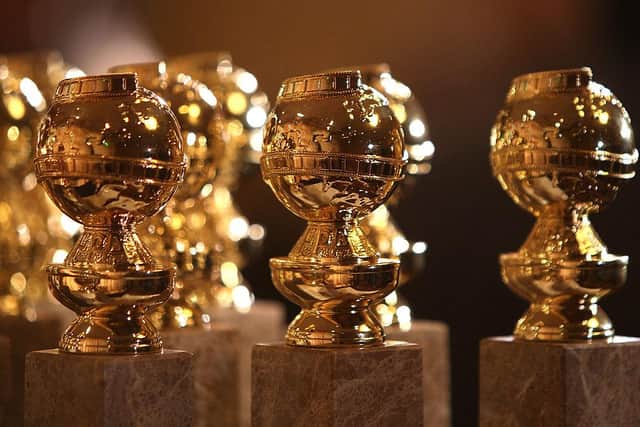 The Golden Globe statuettes on display at the Beverly Hilton Hotel (Photo: Frazer Harrison/Getty Images)
