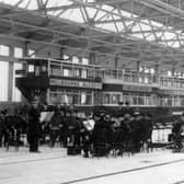 The opening of the new tram depot on Torre Road in April 1937. The opening was performed by Sir Josiah Stamp who was chairman of the LMS Railway Company. It is believed he drove tram No 247A, which is at the head of the line of trams, representing all the types then in service in Leeds. The band performing in the foreground is the Leeds City Tramways Brass Band.