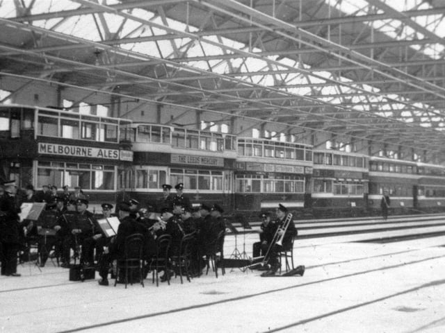 The opening of the new tram depot on Torre Road in April 1937. The opening was performed by Sir Josiah Stamp who was chairman of the LMS Railway Company. It is believed he drove tram No 247A, which is at the head of the line of trams, representing all the types then in service in Leeds. The band performing in the foreground is the Leeds City Tramways Brass Band.