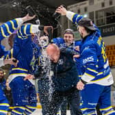 TRADITION: Head coach Ryan Aldridge gets a soaking from his players after their NIHL National play-off triumph. Picture: Miles Tidman/Knights Media