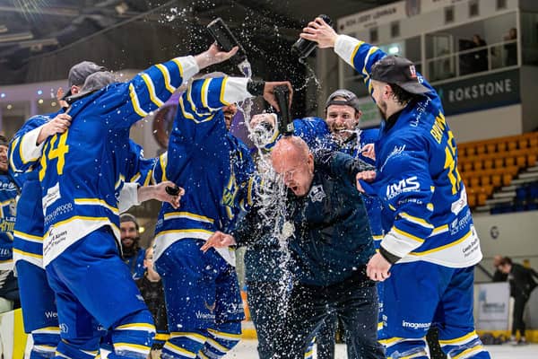 TRADITION: Head coach Ryan Aldridge gets a soaking from his players after their NIHL National play-off triumph. Picture: Miles Tidman/Knights Media