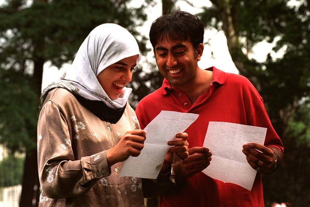 Lawnswood School students Mayada Younis (left) and Ajit Sigh Rai are both delighted after opening their A-level results in August 1997.