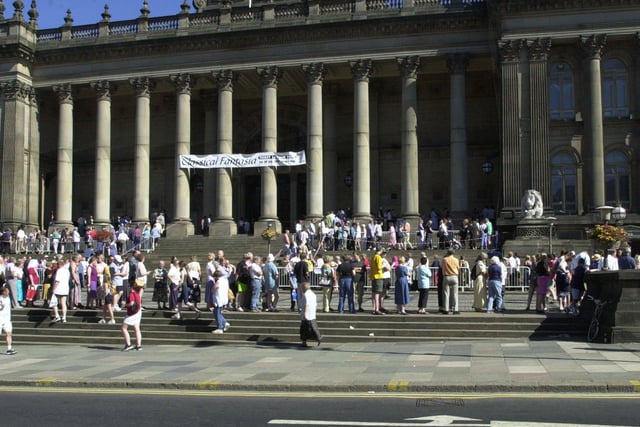 People queue on the Leeds Town Hall steps to snap up free Classical Fantasia tickets in July 2001.