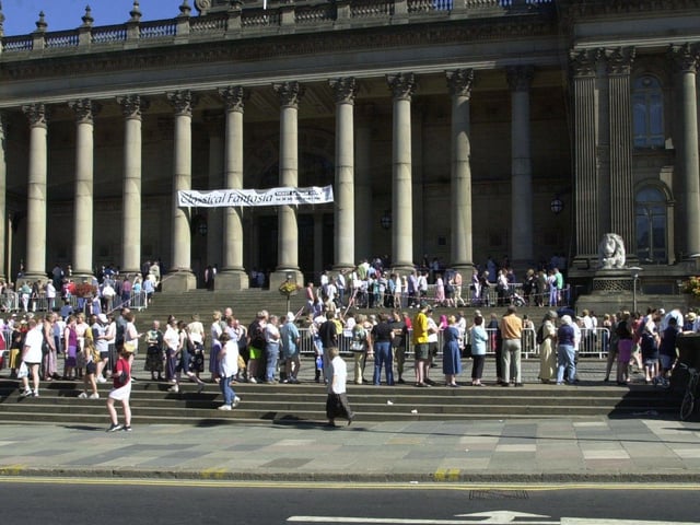 People queue on the Leeds Town Hall steps to snap up free Classical Fantasia tickets in July 2001.