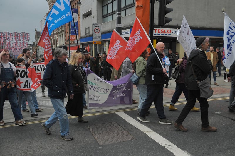Campaigners held banners for Unison, Workers' Power and the NHS in the show of support for those on strike. Picture: Steve Riding.